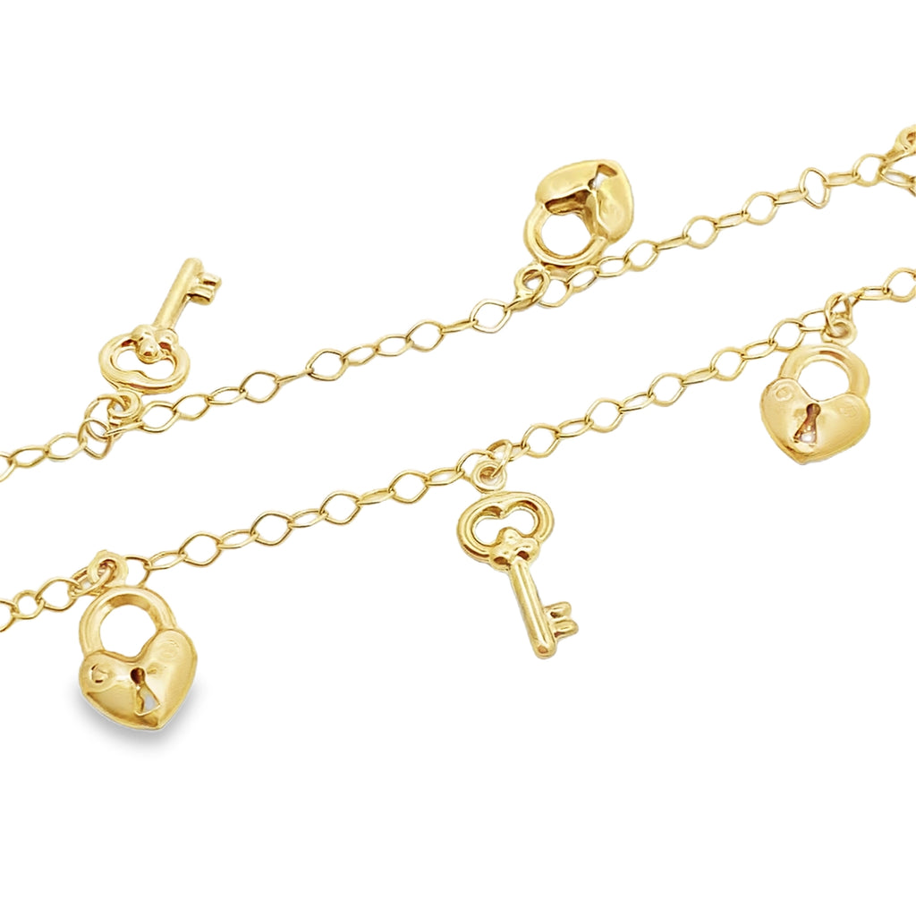 10K Yellow Gold Free Form Link W/Charms Anklet 10In 2.8Dwt